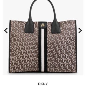 Beautiful tote for sale can use for travelling and book bag brand new with tag.